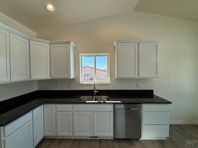 Beautiful 3-bedroom, 2-bathroom ranch-style home with a 3-car on Desert Hawk At Pueblo West in Colorado - for sale on GolfHomes.com, golf home, golf lot