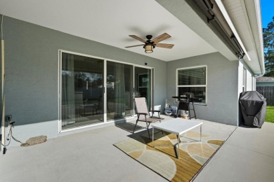 Immaculate Seagate-built Willow model located in the desirable on The Grand Club - Pine Lakes Course in Florida - for sale on GolfHomes.com, golf home, golf lot