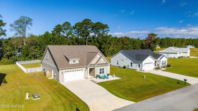 This beautifully crafted home combines refined finishes with on Minnesott Golf and Country Club in North Carolina - for sale on GolfHomes.com, golf home, golf lot