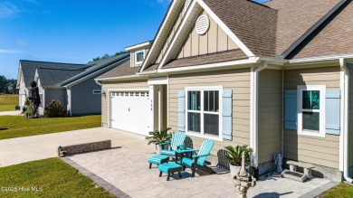 This beautifully crafted home combines refined finishes with on Minnesott Golf and Country Club in North Carolina - for sale on GolfHomes.com, golf home, golf lot