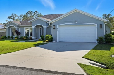 Immaculate Seagate-built Willow model located in the desirable on The Grand Club - Pine Lakes Course in Florida - for sale on GolfHomes.com, golf home, golf lot