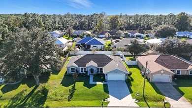 Immaculate Seagate-built Willow model located in the desirable on The Grand Club - Pine Lakes Course in Florida - for sale on GolfHomes.com, golf home, golf lot
