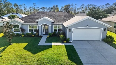 Immaculate Seagate-built Willow model located in the desirable on The Grand Club - Pine Lakes Course in Florida - for sale on GolfHomes.com, golf home, golf lot