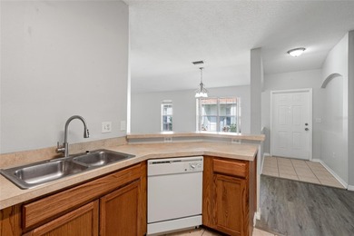 One or more photo(s) has been virtually staged. Step into a home on The Links of Lake Bernadette in Florida - for sale on GolfHomes.com, golf home, golf lot