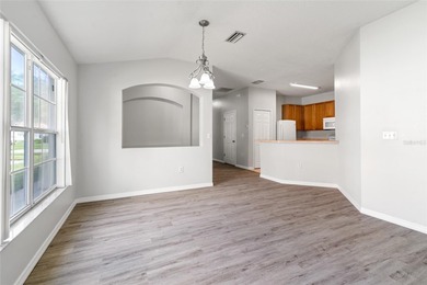 One or more photo(s) has been virtually staged. Step into a home on The Links of Lake Bernadette in Florida - for sale on GolfHomes.com, golf home, golf lot