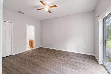 One or more photo(s) has been virtually staged. Step into a home on The Links of Lake Bernadette in Florida - for sale on GolfHomes.com, golf home, golf lot