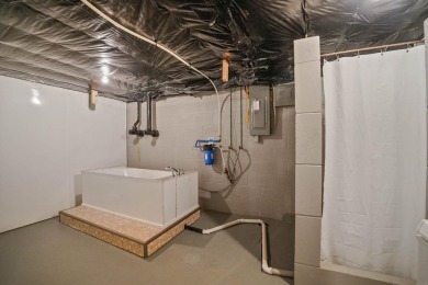 Situated on nearly an acre along a hard-surfaced road at the on Aplington Recreation Complex in Iowa - for sale on GolfHomes.com, golf home, golf lot