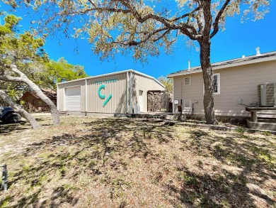 This is a Charming Coastal Retreat with detached barn nestled on Lamar Golf Course in Texas - for sale on GolfHomes.com, golf home, golf lot