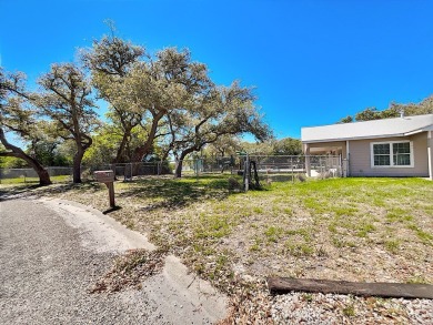 This is a Charming Coastal Retreat with detached barn nestled on Lamar Golf Course in Texas - for sale on GolfHomes.com, golf home, golf lot