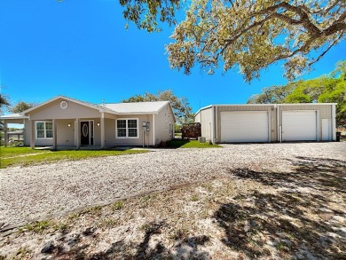 This is a Charming Coastal Retreat with detached barn nestled on Lamar Golf Course in Texas - for sale on GolfHomes.com, golf home, golf lot