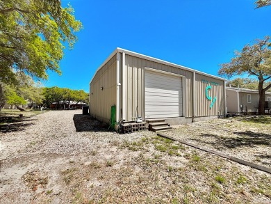 This is a Charming Coastal Retreat with detached barn nestled on Lamar Golf Course in Texas - for sale on GolfHomes.com, golf home, golf lot