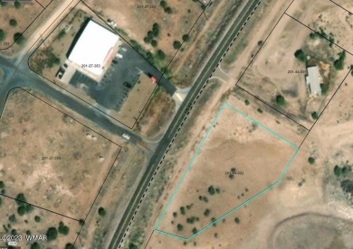 1.24 acre lot directly across from Family Dollar in Concho on Concho Valley Country Club in Arizona - for sale on GolfHomes.com, golf home, golf lot