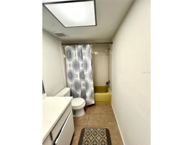 This spacious CORNER Unit located on the 14th Hole of Seven on Seven Springs Golf and Country Club in Florida - for sale on GolfHomes.com, golf home, golf lot
