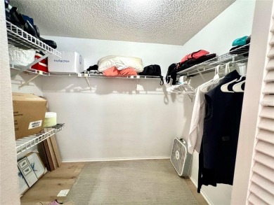 This spacious CORNER Unit located on the 14th Hole of Seven on Seven Springs Golf and Country Club in Florida - for sale on GolfHomes.com, golf home, golf lot
