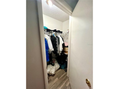 This spacious CORNER Unit located on the 14th Hole of Seven on Seven Springs Golf and Country Club in Florida - for sale on GolfHomes.com, golf home, golf lot