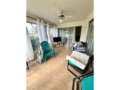 This spacious CORNER Unit located on the 14th Hole of Seven on Seven Springs Golf and Country Club in Florida - for sale on GolfHomes.com, golf home, golf lot