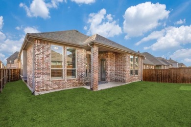 Welcome Home to this ranch style Highland home located in The on The Tribute At the Colony in Texas - for sale on GolfHomes.com, golf home, golf lot