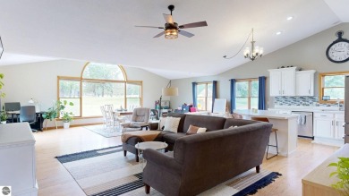 Discover your dream lifestyle in this 3 bedroom 2 bath home that on The Pines Golf Course at Lake Isabella in Michigan - for sale on GolfHomes.com, golf home, golf lot