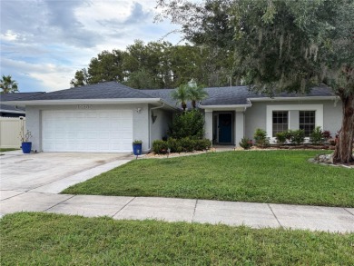Welcome Home! This beautifully maintained 4-bedroom, 2-bathroom on Hunters Creek Golf Course in Florida - for sale on GolfHomes.com, golf home, golf lot