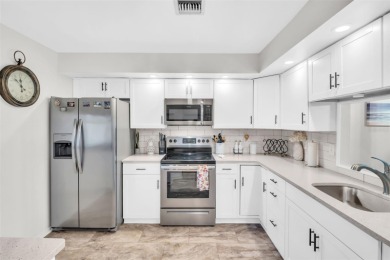 GORGEOUS two bed/two bath condo in the desirable Landings on Highland Lakes Executive Golf Course in Florida - for sale on GolfHomes.com, golf home, golf lot