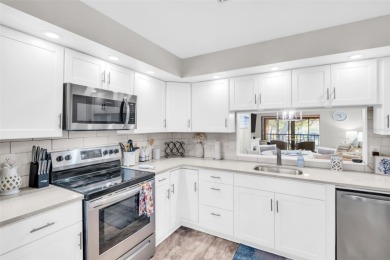 GORGEOUS two bed/two bath condo in the desirable Landings on Highland Lakes Executive Golf Course in Florida - for sale on GolfHomes.com, golf home, golf lot