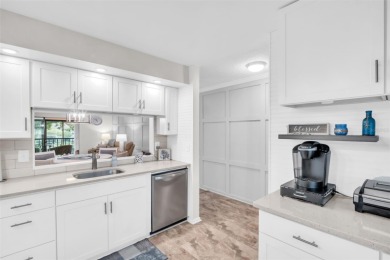 GORGEOUS two bed/two bath condo in the desirable Landings on Highland Lakes Executive Golf Course in Florida - for sale on GolfHomes.com, golf home, golf lot