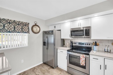 GORGEOUS two bed/two bath condo in the desirable Landings on Highland Lakes Executive Golf Course in Florida - for sale on GolfHomes.com, golf home, golf lot