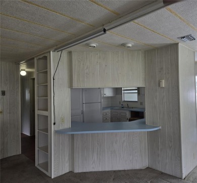 ZELLWOOD STATION 2 BEDROOM 2 BATH HOME. FEE SIMPLE, MEMBRANE on Zellwood Station Country Club in Florida - for sale on GolfHomes.com, golf home, golf lot