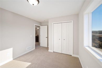 This home is under construction with an estimated completion end on Sanbrook Golf Course in Minnesota - for sale on GolfHomes.com, golf home, golf lot