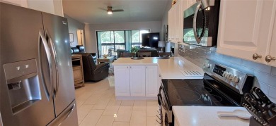 Step into this spacious, beautifully renovated, end-unit condo on Lake Wales Country Club in Florida - for sale on GolfHomes.com, golf home, golf lot