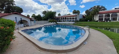 Step into this spacious, beautifully renovated, end-unit condo on Lake Wales Country Club in Florida - for sale on GolfHomes.com, golf home, golf lot
