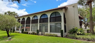 Step into this spacious, beautifully renovated, end-unit condo on Lake Wales Country Club in Florida - for sale on GolfHomes.com, golf home, golf lot