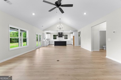 NEW CONSTRUCTION - MOVE IN READY! Welcome to newly built on Raintree Country Club in Georgia - for sale on GolfHomes.com, golf home, golf lot
