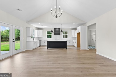 NEW CONSTRUCTION - MOVE IN READY! Welcome to newly built on Raintree Country Club in Georgia - for sale on GolfHomes.com, golf home, golf lot