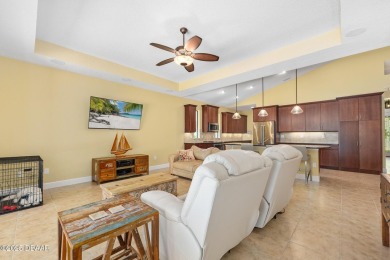 This custom home built 2018 sits on over  3/4  of an acre, in on Plantation Bay Golf and Country Club in Florida - for sale on GolfHomes.com, golf home, golf lot