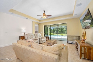 This custom home built 2018 sits on over  3/4  of an acre, in on Plantation Bay Golf and Country Club in Florida - for sale on GolfHomes.com, golf home, golf lot