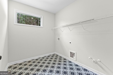 NEW CONSTRUCTION - MOVE IN READY! Welcome to newly built on Raintree Country Club in Georgia - for sale on GolfHomes.com, golf home, golf lot