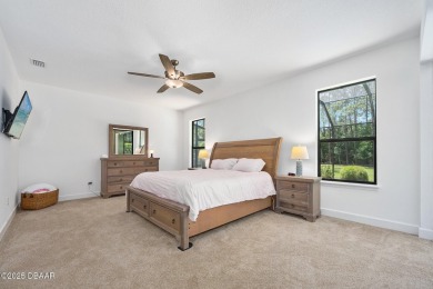 This custom home built 2018 sits on over  3/4  of an acre, in on Plantation Bay Golf and Country Club in Florida - for sale on GolfHomes.com, golf home, golf lot