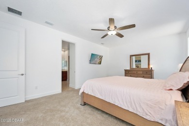 This custom home built 2018 sits on over  3/4  of an acre, in on Plantation Bay Golf and Country Club in Florida - for sale on GolfHomes.com, golf home, golf lot