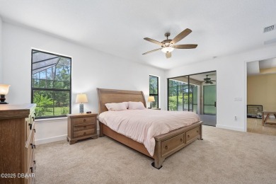 This custom home built 2018 sits on over  3/4  of an acre, in on Plantation Bay Golf and Country Club in Florida - for sale on GolfHomes.com, golf home, golf lot