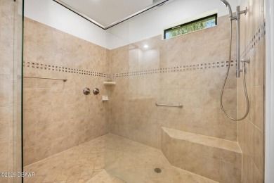 This custom home built 2018 sits on over  3/4  of an acre, in on Plantation Bay Golf and Country Club in Florida - for sale on GolfHomes.com, golf home, golf lot