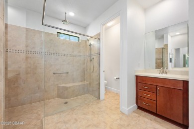 This custom home built 2018 sits on over  3/4  of an acre, in on Plantation Bay Golf and Country Club in Florida - for sale on GolfHomes.com, golf home, golf lot