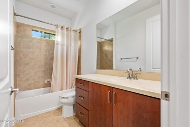 This custom home built 2018 sits on over  3/4  of an acre, in on Plantation Bay Golf and Country Club in Florida - for sale on GolfHomes.com, golf home, golf lot