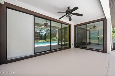 This custom home built 2018 sits on over  3/4  of an acre, in on Plantation Bay Golf and Country Club in Florida - for sale on GolfHomes.com, golf home, golf lot