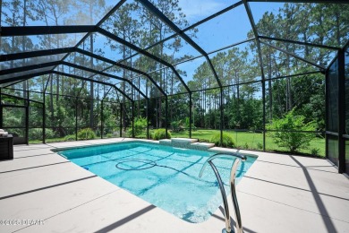 This custom home built 2018 sits on over  3/4  of an acre, in on Plantation Bay Golf and Country Club in Florida - for sale on GolfHomes.com, golf home, golf lot