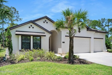 This custom home built 2018 sits on over  3/4  of an acre, in on Plantation Bay Golf and Country Club in Florida - for sale on GolfHomes.com, golf home, golf lot
