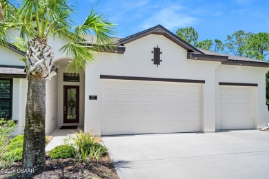 This custom home built 2018 sits on over  3/4  of an acre, in on Plantation Bay Golf and Country Club in Florida - for sale on GolfHomes.com, golf home, golf lot