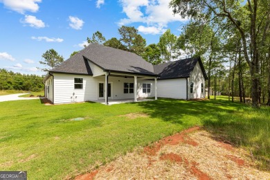 NEW CONSTRUCTION - MOVE IN READY! Welcome to newly built on Raintree Country Club in Georgia - for sale on GolfHomes.com, golf home, golf lot