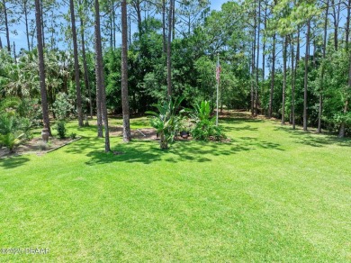 This custom home built 2018 sits on over  3/4  of an acre, in on Plantation Bay Golf and Country Club in Florida - for sale on GolfHomes.com, golf home, golf lot