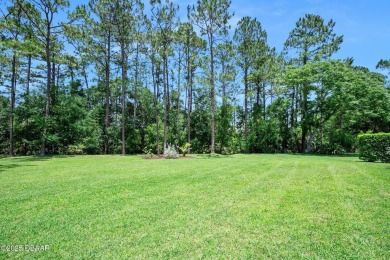 This custom home built 2018 sits on over  3/4  of an acre, in on Plantation Bay Golf and Country Club in Florida - for sale on GolfHomes.com, golf home, golf lot